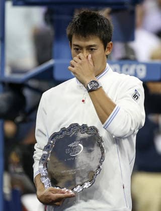2014 US Open - Men s singles final NEW YORK, NY - SEPTEMBER 8 : Kei Nishikori of Japan poses with the runners up trophy after losing against Marin Cilic of Croatia in the men s singles final match on Day 15 of the 2014 US Open at the USTA Billie Jean King National Tennis Center in New York, United States on September 8, 2014. Bilgin Sasmaz Anadolu Agency New York United States. Editorial use only. Please get in touch for any other usage.  Copyright: x2025xAnadoluxBilginxS.xÅžaÅümazx