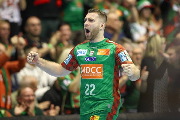 18.12.2025, xtgx, Handball, DHB Pokal Viertelfinale, SC Magdeburg - SG Flensburg Handewitt v.l. Lukas Mertens (Magdeburg, 22) Jubel, Torjubel, jubelt ueber das Tor, celebrate the goal, celebration Magdeburg