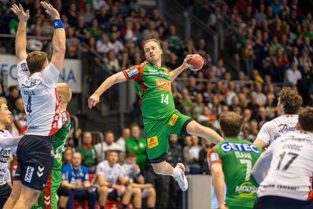 Deutschland: Handball DHB-Pokal 2025 26, Viertelfinale - SC Magdeburg vs SG Flensburg-Handewitt - GETEC Arena (Magdeburg): Omar Ingi Magnusson (SC Magdeburg, 14) Copyright: xTomxLauruschkatx