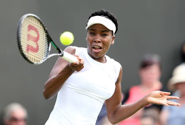 2014 Wimbledon Championships LONDON, ENGLAND - JUNE 23: Venus Williams of the United States returns the ball during her Ladies Singles first round match against Maria-Teresa Torro-Flor of Spain on day one of the Wimbledon Lawn Tennis Championships at the All England Lawn Tennis and Croquet Club at Wimbledon on June 23, 2014 in London, England. Londra London, City of. Editorial use only. Please get in touch for any other usage.  Copyright: x2025xAnadoluxYunusxKaymazx