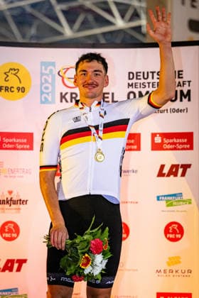 AUGENSTEIN Moritz: DM Omnium 2025 - Frankfurt Oder AUGENSTEIN Moritz ( GER ) RSV Irschenberg Winner - First Place - Award Ceremony - Medal Ceremony - Podium - Hochformat - Hoch - Vertikal - Portrait - Event Veranstaltung: DM Omnium 2025 - Deutsche Meisterschaft - Category Kategorie: Cycling - Track cycling, Rad, Radsport, Bahnrad, Bahn National Championship Omnium - Elite Men - Location Ort: Europe Germany - Brandenburg - Märkisch Oderland - Frankfurt Oder - Oderlandhalle - Discipline: Omnium Points Race 4. Race - Distance: 25 km - Date Datum: 19.12.2025 Friday Day 1 -