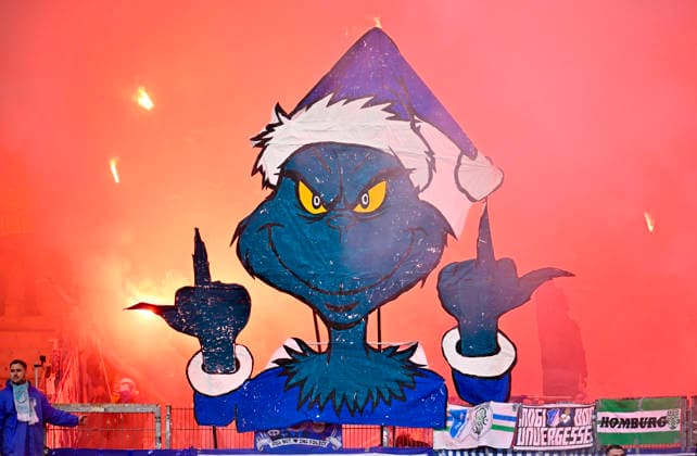 vor Spielbeginn: Choreo, Choreographie, Fanaktion GRINCH Transparent, Protest, Protestplakat, Fanplakat, Banner, Plakat, Spruchband WIR VERMIESEN EUCH DAS FEST !TSG 1899 Hoffenheim Fanblock, Fans, Fankurve, Flaggen, Fahnen, Stimmung, stimmungsvoll Bengalos, Pyrotechnik, Pyro, Feuerwerkskoerper, Stinkefinger VfB Stuttgart vs TSG 1899 Hoffenheim 20.12.2025 DFL REGULATIONS PROHIBIT ANY USE OF PHOTOGRAPHS AS IMAGE SEQUENCES AND OR QUASI-VIDEO VfB Stuttgart vs TSG 1899 Hoffenheim