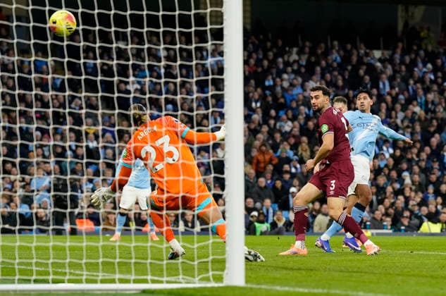 Manchester, England, 20th December 2025. Tijjani Reijnders of Manchester City (R) scores the second goal during the Manchester City vs West Ham United Premier League match at the Etihad Stadium, Manchester. Picture credit should read: Andrew Yates Sportimage EDITORIAL USE ONLY. No use with unauthorised audio, video, data, fixture lists, club league logos or live services. Online in-match use limited to 120 images, no video emulation. No use in betting, games or single club league player publications. SPI_015_AY_MAN_CITY_WEST_HAM SPI-4385-0015