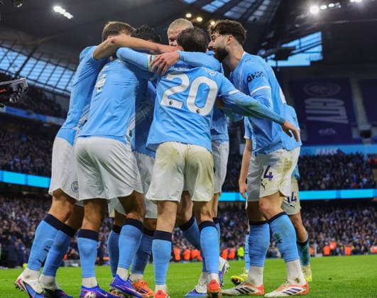 20th December 2025; Etihad Stadium, Manchester, Lancashire, England; Premier League Football, Manchester City versus West Ham United; Tijjani Reijnders of Manchester City is congratulated by after scoring to make it 2-0 in the 38th minute  RogerxEvans