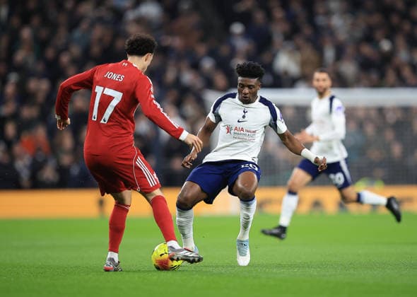 Tottenham Hotspur v Liverpool Premier League 20 12 2025. Liverpool Midfielder Curtis Jones (17) under Pressure from Tottenham Hotspur Midfielder Mohammed Kudus (20) during the Premier League match between Tottenham Hotspur and Liverpool at Tottenham Hotspur Stadium, London, United Kingdom on 20 December 2025. London Tottenham Hotspur Stadium London United Kingdom Editorial use only DataCo restrictions apply See www.football-dataco.com , Copyright: xChrisxFoxwellx PSI-23445-0011