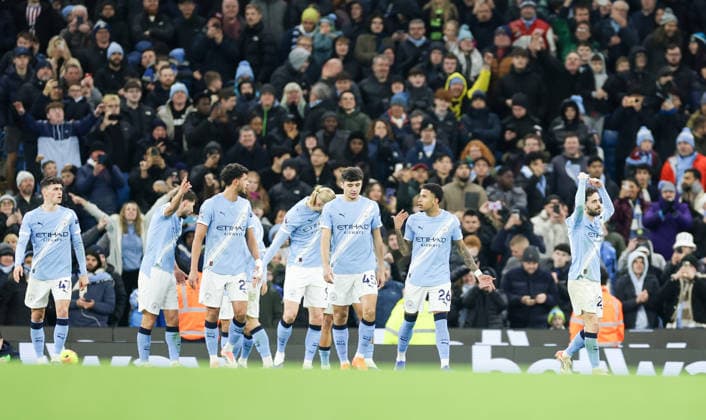 20th December 2025; Etihad Stadium, Manchester, Lancashire, England; Premier League Football, Manchester City versus West Ham United; City players celebrate after Erling Haaland of Manchester City scores his second goal to make the score 3-0 in the 69th minute  RogerxEvans