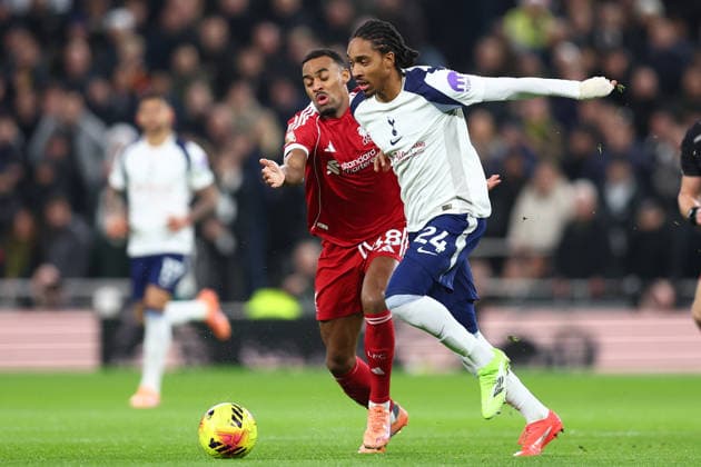 London, England, 20th December 2025. Ryan Gravenberch of Liverpool and Djed Spence of Tottenham Hotspur challenge for the ball during the Tottenham Hotspur vs Liverpool Premier League match at the Tottenham Hotspur Stadium, London. Picture credit should read: Paul Terry Sportimage EDITORIAL USE ONLY. No use with unauthorised audio, video, data, fixture lists, club league logos or live services. Online in-match use limited to 120 images, no video emulation. No use in betting, games or single club league player publications. SPI_015_PT_Tottenham_Liverpool SPI-4387-0015