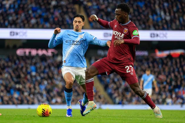 Manchester City v West Ham United Premier League 20 12 2025. Tijjani Reijnders (4) of Manchester City is challenged by Soungoutou Magassa (27) of West Ham United during the Premier League match between Manchester City and West Ham United at the Etihad Stadium, Manchester, England on 20 December 2025. Manchester Etihad Stadium Manchester England Editorial use only DataCo restrictions apply See www.football-dataco.com , Copyright: xConorxMolloyx PSI-23451-0079