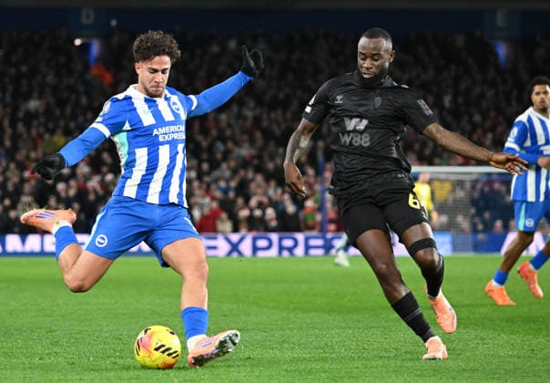 Charalampos Kostoulas of Brighton tries to find a way past Lutsharel Geertruida of Sunderland during the Premier League match between Brighton and Hove Albion and Sunderland at the American Express Stadium, Brighton UK - Saturday 20th December 2025 Brighton v Sunderland Premier League Football, Amex Stadium, Sussex, UK - 20 Dec 2025Brighton Amex Stadium Sussex United Kingdom Editorial use only. No merchandising. For Football images FA and Premier League restrictions apply inc. no internet mobile usage without FAPL license - for details contact Football Dataco  Copyright: xLizxFinlayson TPI Shutterstockx 16159610az