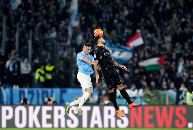 Adam Marusic (SS Lazio) and Giuseppe Pezzella (US Cremonese) battle for the ball, Serie A, SS Lazio v US Cremonese, Olimpico Stadium, December 20, 2025, Roma, Italy.