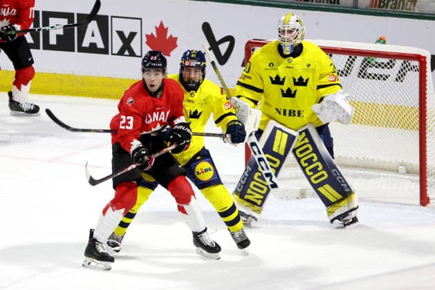 December 20, 2025, London, On, Canada: Canada forward Sam O Reilly (23) battles with Sweden forward Viggo Bjorck (21) in front of goaltender Love Harenstam (30) during the first period of a IIHF World Junior Hockey Championship pre-tournament game in London, Ont., Saturday, December 20, 2025. Canada News - December 20, 2025  - ZUMAc35_ 20251220_zaf_c35_053 Copyright: xNicolexOsbornex