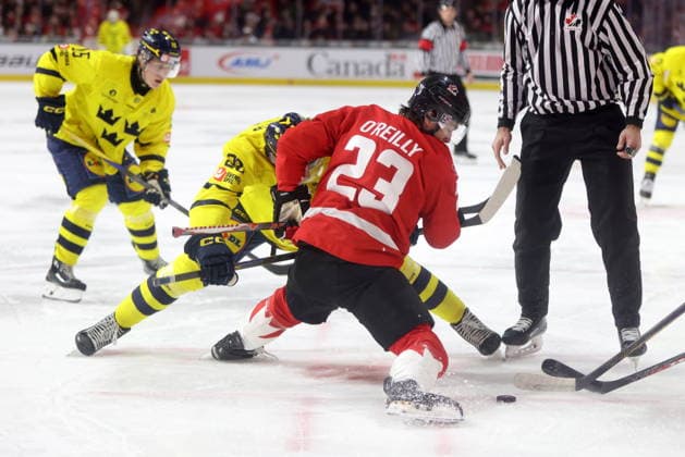 December 20, 2025, London, On, Canada: Canada forward Sam OReilly (23) wins the face off against Sweden during the first period of a IIHF World Junior Hockey Championship pre-tournament game in London, Ont., Saturday, December 20, 2025. Canada News - December 20, 2025  - ZUMAc35_ 20251220_zaf_c35_065 Copyright: xNicolexOsbornex