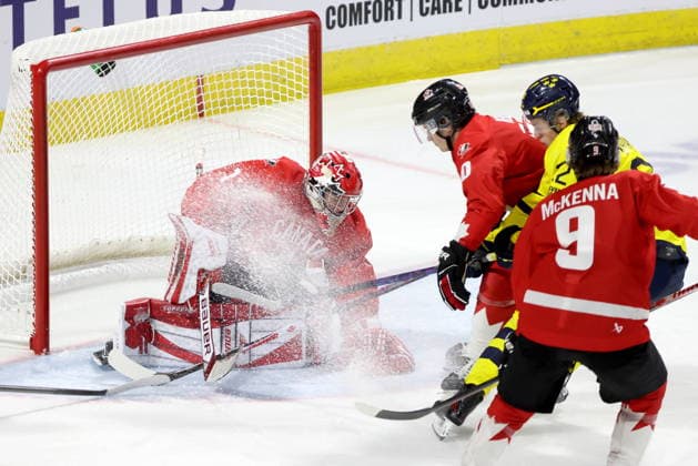 December 20, 2025, London, On, Canada: Canada goaltender Jack Ivankovic (1) makes a save against Sweden during the third period of a IIHF World Junior Hockey Championship pre-tournament game in London, Ont., Saturday, December 20, 2025. Canada News - December 20, 2025  - ZUMAc35_ 20251220_zaf_c35_081 Copyright: xNicolexOsbornex