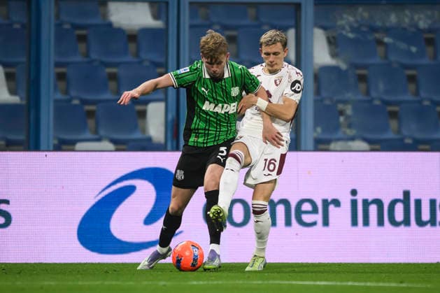 US Sassuolo v Torino FC - Serie A Josh Doig of US Sassuolo competes for the ball with Marcus Pedersen of Torino FC during the Serie A football match between US Sassuolo and Torino FC. Reggio Emilia Italy Copyright: xNicolòxCampox