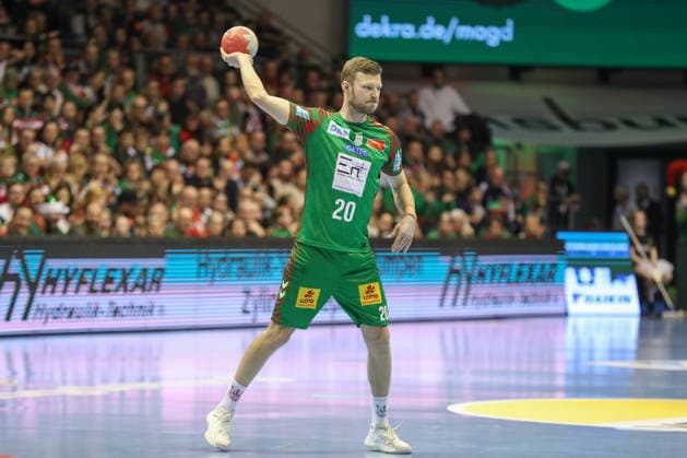 21.12.2025, xgox, Handball - Daikin HBL SC Magdeburg - SC DHfK Leipzig emspor, v.l. Philipp Weber (Magdeburg, 20) am Ball, plays the ball Magdeburg