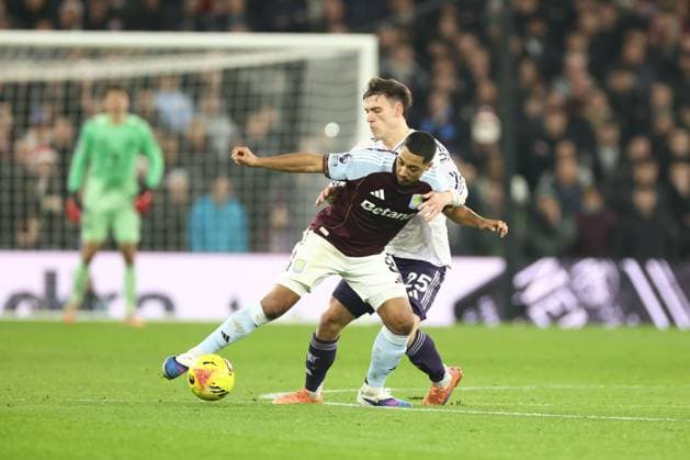 Manuel Ugarte of Manchester United, ManU and Youri Tielemans of Aston Villa Aston Villa v Manchester United, Premier League, Football, Villa Park, Birmingham, UK - 21 Dec 2025Birmingham Villa Park United Kingdom EDITORIAL USE ONLY No use with unauthorised audio, video, data, fixture lists, club league logos or live services. Online in-match use limited to 120 images, no video emulation. No use in betting, games or single club league player publications. Copyright: xRyanxBrowne Shutterstockx 16151365bd