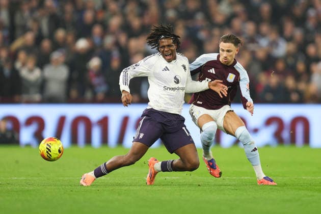 Birmingham, England, 21st December 2025. Patrick Dorgu of Manchester United, ManU and Matty Cash of Aston Villa during the Aston Villa vs Manchester United Premier League match at Villa Park, Birmingham. Picture credit should read: James Baylis Sportimage EDITORIAL USE ONLY. No use with unauthorised audio, video, data, fixture lists, club league logos or live services. Online in-match use limited to 120 images, no video emulation. No use in betting, games or single club league player publications. SPI_019_JB_ASTON_VILLA_MANUTD SPI-4388-0019