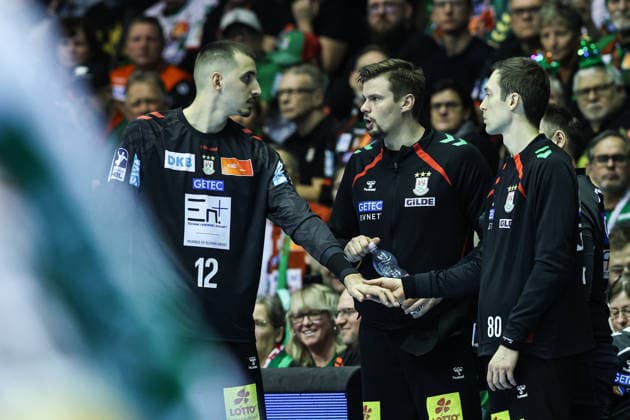 Matej Mandic (SC Magdeburg,12), Torwart Sergey Hernandez Ferrer (SC Magdeburg,1), Torwart Nikola Portner (SC Magdeburg,80) - Handball Bundesliga Saison 2025-2026 SC Magdeburg vs. SC DHFK Leipzig in der GETEC Arena in Magdeburg - Handball,Deutschland,21.12.2025