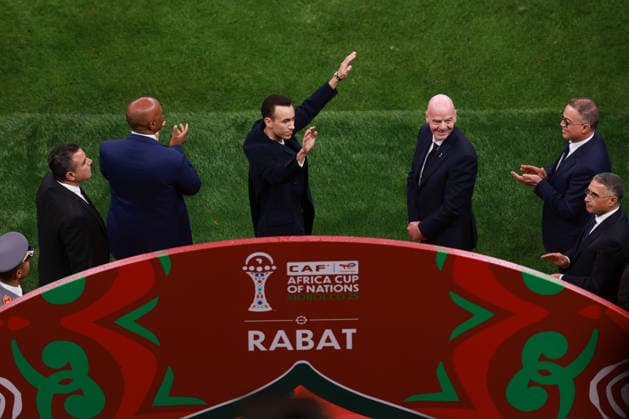 MOROCCO, RABAT - 21 December 2025 - Morocco s Crown Prince Moulay El Hassan (C) and FIFA President Gianni Infantino (R) attend the opening ceremony during the Africa Cup of Nations 2025 group A match between national team, Nationalteam of Morocco and National team Comoros at the Prince Moulay Abdellah Stadium in Rabat on 21 December 2025 Morocco v Comoros - AFCON 2025 - Group A Copyright: xSFSIx