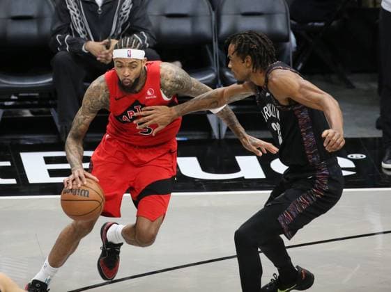 (251222) -- NEW YORK, Dec. 22, 2025 -- Brandon Ingram (L) of Toronto Raptors dribbles during the 2025-2026 NBA, Basketball Herren, USA regular season game between Brooklyn Nets and Toronto Raptors in New York, the United States, Dec. 21, 2025. ) (SP)U.S.-NEW YORK-BASKETBALL-NBA-RAPTORS VS NETS ZhangxFengguo 