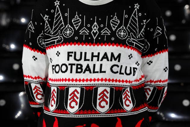 22nd December 2025; Craven Cottage, Fulham, London, England; Premier League Football, Fulham versus Nottingham Forest; Fulham fan wearing a Fulham Christmas jumper inside Craven Cottage  JohnxPatrickxFletcher