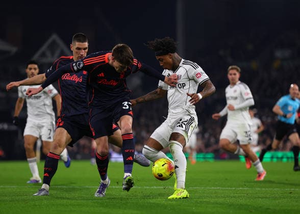 22nd December 2025; Craven Cottage, Fulham, London, England; Premier League Football, Fulham versus Nottingham Forest; Kevin of Fulham challenged by Nicolo Savona of Nottingham Forest  JohnxPatrickxFletcher