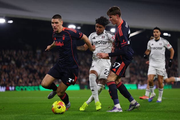 22nd December 2025; Craven Cottage, Fulham, London, England; Premier League Football, Fulham versus Nottingham Forest; Kevin of Fulham challenged by Nicolo Savona and Nikola Milenkovic of Nottingham Forest  JohnxPatrickxFletcher