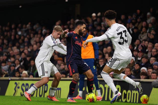 22nd December 2025; Craven Cottage, Fulham, London, England; Premier League Football, Fulham versus Nottingham Forest; Douglas Luiz of Nottingham Forest challenged by Emile Smith Rowe and Antonee Robinson of Fulham  JohnxPatrickxFletcher