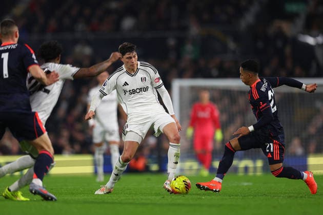 22nd December 2025; Craven Cottage, Fulham, London, England; Premier League Football, Fulham versus Nottingham Forest; Jorge Cuenca of Fulham challenged by Omari Hutchinson of Nottingham Forest  JohnxPatrickxFletcher