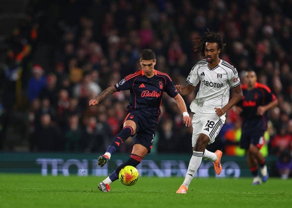 22nd December 2025; Craven Cottage, Fulham, London, England; Premier League Football, Fulham versus Nottingham Forest; Nicolas Dominguez of Nottingham Forest closely marked by Jonah Kusi-Asare of Fulham  JohnxPatrickxFletcher