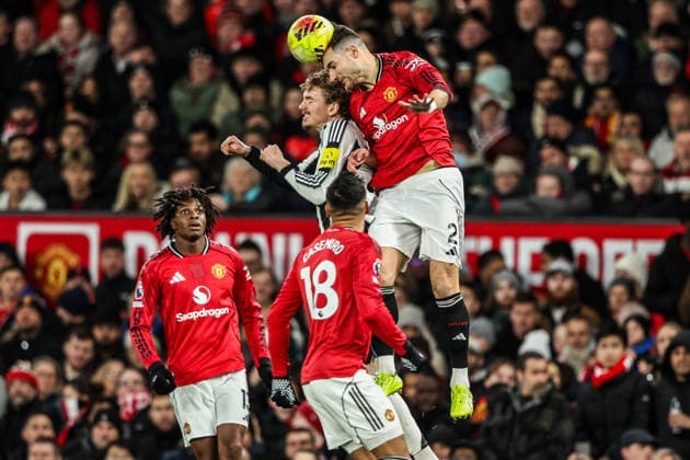 Premier League Manchester United, ManU v Newcastle United Diogo Dalot of Manchester Untied jumps up to win the high ball from Nick Woltemade of Newcastle United during the Premier League match Manchester United vs Newcastle United at Old Trafford, Manchester, United Kingdom, 26th December 2025 (Photo by Alfie Cosgrove News Images) Manchester Old Trafford Greater Manchester United Kingdom Copyright: xAlfiexCosgrove NewsxImagesx