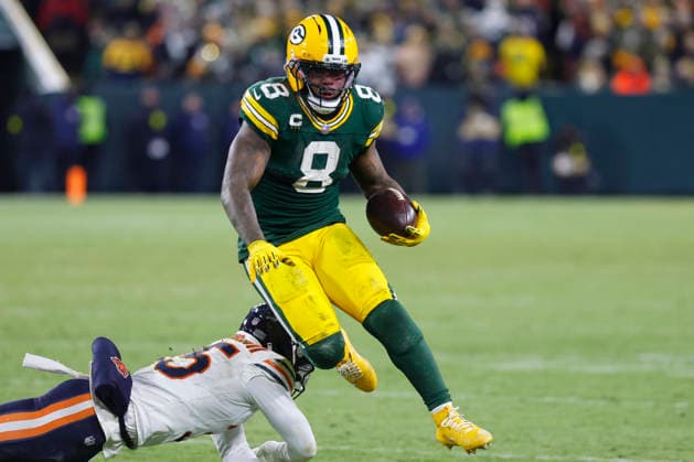 GREEN BAY, WI - DECEMBER 07: Green Bay Packers running back Josh Jacobs (8) dumps over a defender during a game between the Green Bay Packers and the Chicago Bears on December 7, 2025 at Lambeau Field, in Green Bay, WI. (Photo by Larry Radloff Icon Sportswire) NFL, American Football Herren, USA DEC 07 Bears at Packers EDITORIAL USE ONLY Icon2512075738