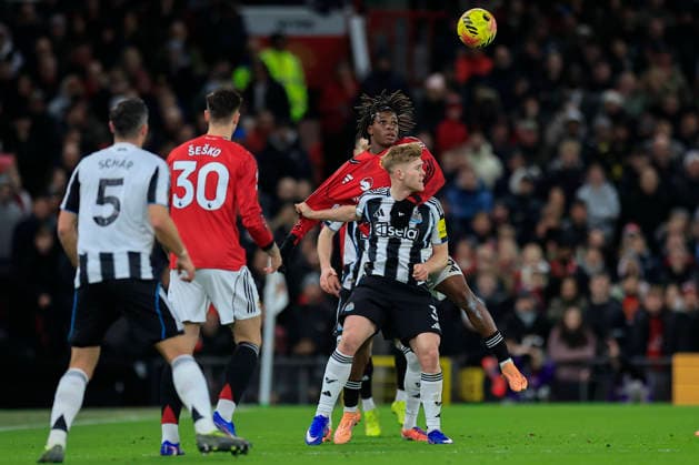 Manchester United, ManU v Newcastle United, Premier League Patrick Dorgu (13) of Manchester United wins the header against Lewis Hall (3) of Newcastle United during the Premier League match between Manchester United and Newcastle United at Old Trafford, Manchester, UK on 26 December 2025. Manchester Old Trafford Greater Manchester UK Editorial use only DataCo restrictions apply See www.football-dataco.com , Copyright: xConorxMolloyx PSI-23465-0041