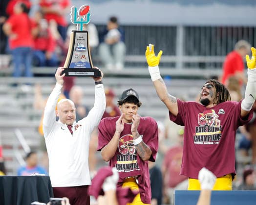 December 26, 2025: Minnesota Golden Gophers head coach P.J. Fleck recieves the Rate Bowl trophy durning th award ceremony after the Rate Bowl game between New Mexico Lobos and Minnesota Golden Gophers at Chase Field in Phoneix, Arizona. . CSM. Phoneix United States of America - ZUMAc04_ 20251226_zma_c04_038 Copyright: xMichaelxCazaresx