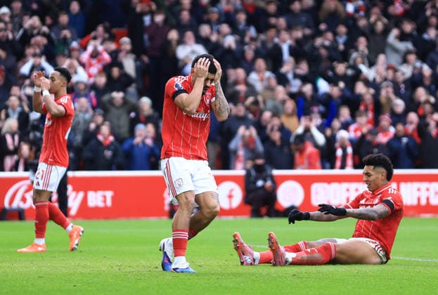 Nottingham, England, 27th December 2025. Morgan Gibbs White of Nottingham Forest (c) reacts to missing an early chance during the Nottingham Forest vs Manchester City Premier League match at the City Ground, Nottingham. Picture credit should read: Jessica Hornby Sportimage EDITORIAL USE ONLY. No use with unauthorised audio, video, data, fixture lists, club league logos or live services. Online in-match use limited to 120 images, no video emulation. No use in betting, games or single club league player publications. SPI_027_JH_Forest_ManC SPI-4395-0027