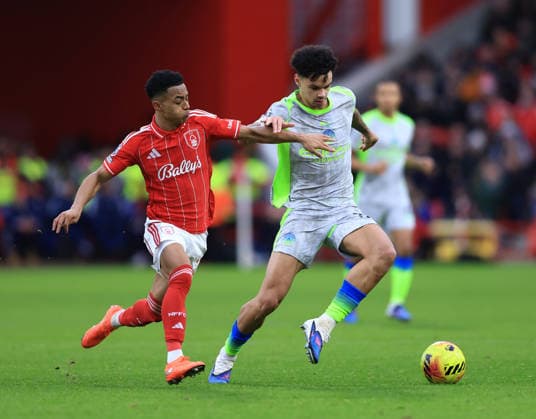 Nottingham, England, 27th December 2025. Omari Hutchinson of Nottingham Forest challenges Nico O™Reilly of Manchester City during the Nottingham Forest vs Manchester City Premier League match at the City Ground, Nottingham. Picture credit should read: Jessica Hornby Sportimage EDITORIAL USE ONLY. No use with unauthorised audio, video, data, fixture lists, club league logos or live services. Online in-match use limited to 120 images, no video emulation. No use in betting, games or single club league player publications. SPI_076_JH_Forest_ManC SPI-4395-0076