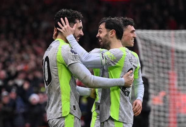 Rayan Cherki of Manchester City celebrates with Bernardo Silva after scoring the team s second goal Nottingham Forest v Manchester City, Premier League, Football, City Ground, Nottingham, UK - 27 Dec 2025Nottingham City Ground United Kingdom EDITORIAL USE ONLY No use with unauthorised audio, video, data, fixture lists, club league logos or live services. Online in-match use limited to 120 images, no video emulation. No use in betting, games or single club league player publications.  Copyright: xAnnaxGowthorpe Shutterstockx 16213158ar
