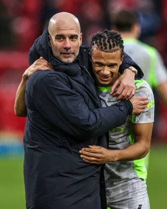 Premier League Nottingham Forest v Manchester City Pep Guardiola manager of Manchester City and Savino of Manchester City celebrate the win during the Premier League match Nottingham Forest vs Manchester City at City Ground, Nottingham, United Kingdom, 27th December 2025 (Photo by Alfie Cosgrove News Images) Nottingham City Ground Nottinghamshire United Kingdom Copyright: xAlfiexCosgrove NewsxImagesx
