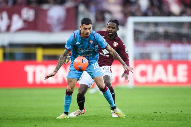 Cagliari Calcio v Torino FC - Serie A Gianluca Gaetano of Cagliari Calcio competes for the ball with Adrien Tameze of Torino FC during the Serie A football match between Cagliari Calcio and Torino FC. Turin Italy Copyright: xNicolòxCampox
