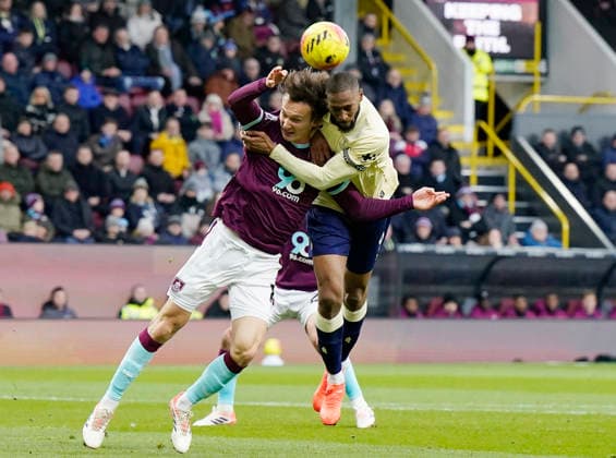 Burnley, England, 27th December 2025. Hjalmar Ekdal of Burnley tussles with Beto of Everton during the Burnley vs Everton Premier League match at Turf Moor, Burnley. Picture credit should read: Andrew Yates Sportimage EDITORIAL USE ONLY. No use with unauthorised audio, video, data, fixture lists, club league logos or live services. Online in-match use limited to 120 images, no video emulation. No use in betting, games or single club league player publications. SPI_020_AY_Burnley_Everton SPI-4396-0020