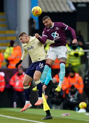 Burnley, England, 27th December 2025. Vitalii Mykolenko of Everton challenges Kyle Walker of Burnley during the Burnley vs Everton Premier League match at Turf Moor, Burnley. Picture credit should read: Andrew Yates Sportimage EDITORIAL USE ONLY. No use with unauthorised audio, video, data, fixture lists, club league logos or live services. Online in-match use limited to 120 images, no video emulation. No use in betting, games or single club league player publications. SPI_021_AY_Burnley_Everton SPI-4396-0021