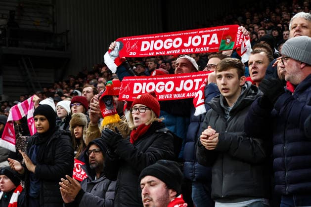 Liverpool fans hold up Diogo Jota scarves and sing his name on twenty minutes Liverpool v Wolverhampton Wanderers, Premier League, Football, Anfield, Liverpool, UK - 27 Dec 2025Liverpool Anfield United Kingdom EDITORIAL USE ONLY No use with unauthorised audio, video, data, fixture lists, club league logos or live services. Online in-match use limited to 120 images, no video emulation. No use in betting, games or single club league player publications. Copyright: xMarkxKerton Shutterstockx 16213163ac