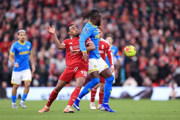 Football - Premier League - Liverpool v Wolverhampton Wanderers 27th December 2025 - Premier League - Liverpool v Wolverhampton Wanderers - Ryan Gravenberch of Liverpool battles with Tolu Arokodare of Wolverhampton Wanderers - Photo: Simon Stacpoole Offside. Liverpool UK Copyright: xSimonxStacpoolexOffside