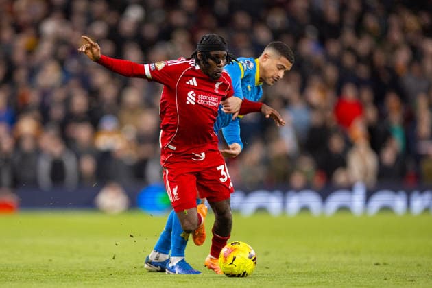 Football - FA Premier League - Liverpool FC v Wolverhampton Wanderers FC LIVERPOOL, ENGLAND - Saturday, December 27, 2025: (L-R) Liverpool s Jeremy Frimpong is challenged by Wolverhampton Wanderers Joao Gomes during the FA Premier League match between Liverpool FC and Wolverhampton Wanderers FC at Anfield. (Photo by David Rawcliffe Propaganda) LIVERPOOL Anfield MERSEYSIDE ENGLAND  Copyright: xDavidxRawcliffex P2025-12-27-Liverpool_Wolves-56