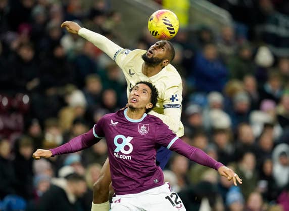 Burnley, England, 27th December 2025. Bashir Humphreys of Burnley tussles with Beto of Everton during the Burnley vs Everton Premier League match at Turf Moor, Burnley. Picture credit should read: Andrew Yates Sportimage EDITORIAL USE ONLY. No use with unauthorised audio, video, data, fixture lists, club league logos or live services. Online in-match use limited to 120 images, no video emulation. No use in betting, games or single club league player publications. SPI_032_AY_Burnley_Everton SPI-4396-0032