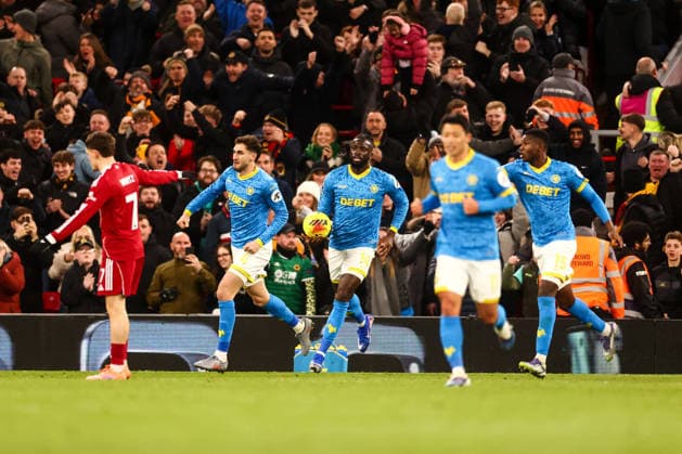 Santiago Bueno of Wolverhampton Wanderers scores his sides first goal of the match and celebrates with team mates Liverpool v Wolverhampton Wanderers, Premier League, Football, Anfield, Liverpool, UK - 27 Dec 2025Liverpool Anfield United Kingdom EDITORIAL USE ONLY No use with unauthorised audio, video, data, fixture lists, club league logos or live services. Online in-match use limited to 120 images, no video emulation. No use in betting, games or single club league player publications.  Copyright: xMarkxKerton Shutterstockx 16213163bq