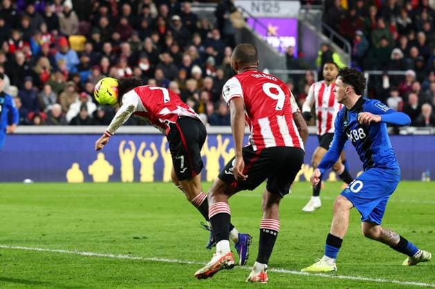 Kevin Schade of Brentford scoring his third goal of the match (4-1) Brentford v AFC Bournemouth, Premier League, Football, Gtech Community Stadium, London, UK - 27 Dec 2025London Gtech Community Stadium United Kingdom EDITORIAL USE ONLY No use with unauthorised audio, video, data, fixture lists, club league logos or live services. Online in-match use limited to 120 images, no video emulation. No use in betting, games or single club league player publications.  Copyright: xSimonxDael Shutterstockx 16213161ak
