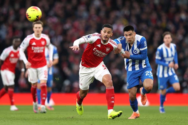 Arsenal v Brighton & Hove Albion 27 December 2025 London - Premier League Football - Arsenal v Brighton & Hove Albion - William Saliba of Arsenal is held by Diego Gomez of Brighton & Hove Albion - (Photo by Mark Leech). London UK Copyright: xMarkxLeechxOffside