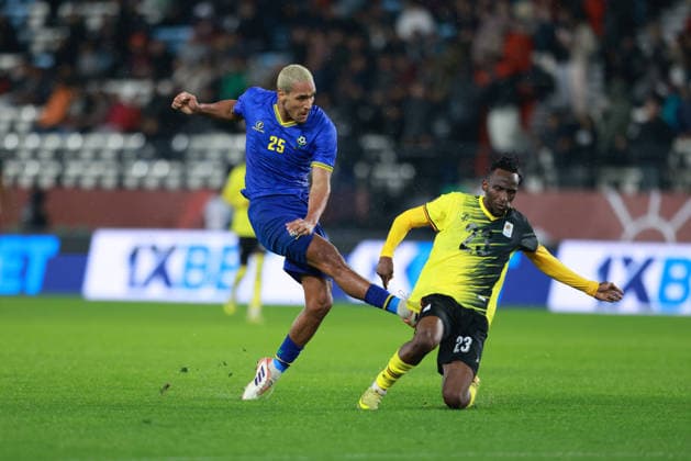 RABAT, MOROCCO - December 27, 2025 - Haji Mnogai of Tanzania and Aziz Kayondo of Uganda national team, Nationalteam in action during the match between UGANDA national team and TANZANIA national team in football at Africa Cup of Nations 2025 in Al Medina Stadium in Rabat Morocco AFCON 2025 - Uganda v Tanzania Copyright: xSFSI SebastianxFrejx