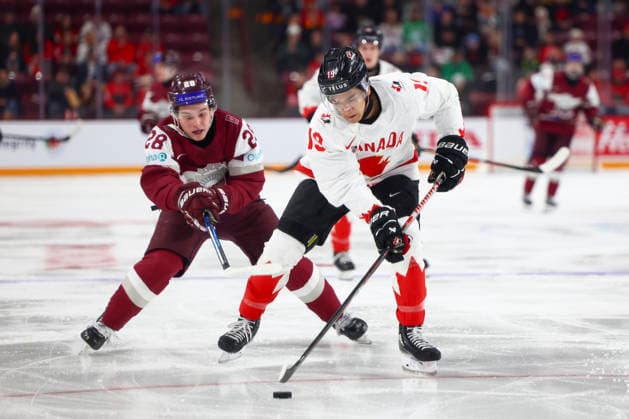December 27, 2025, Minneapolis, Minnesota, United States: Canada forward ZAYNE PAREKH (19) collects the puck in CanadaÃ¢â‚¬â ¢s defensive zone. Canada and Latvia faced off in the opening round of the IIHF World Junior Championship on December 27th. Canada was victorious, winning 2-1 in overtime. Minneapolis United States - ZUMAt166 20251227_zsp_t166_008 Copyright: xMichaelxTurnerx